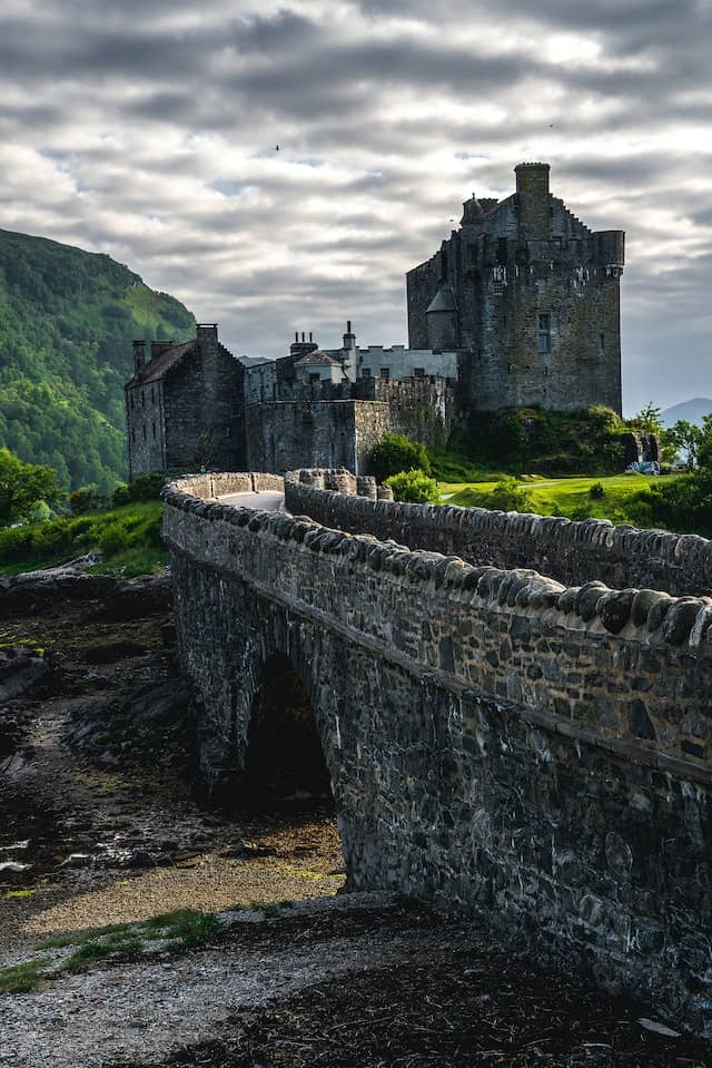 Eilean Donan Castle in Scotland, UK, with footbridge leading up to castle